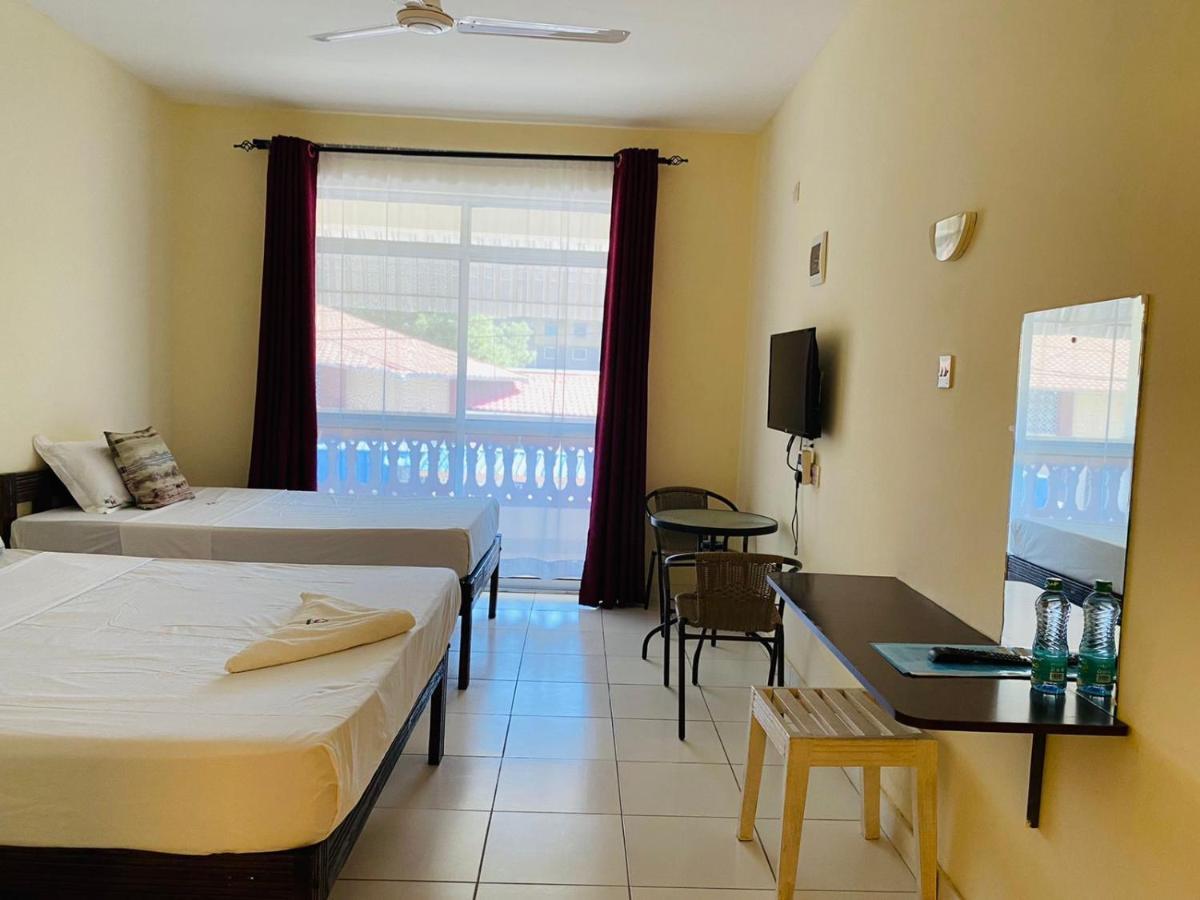 Merry Villa Hotel & Apartments Момбаса Екстериор снимка