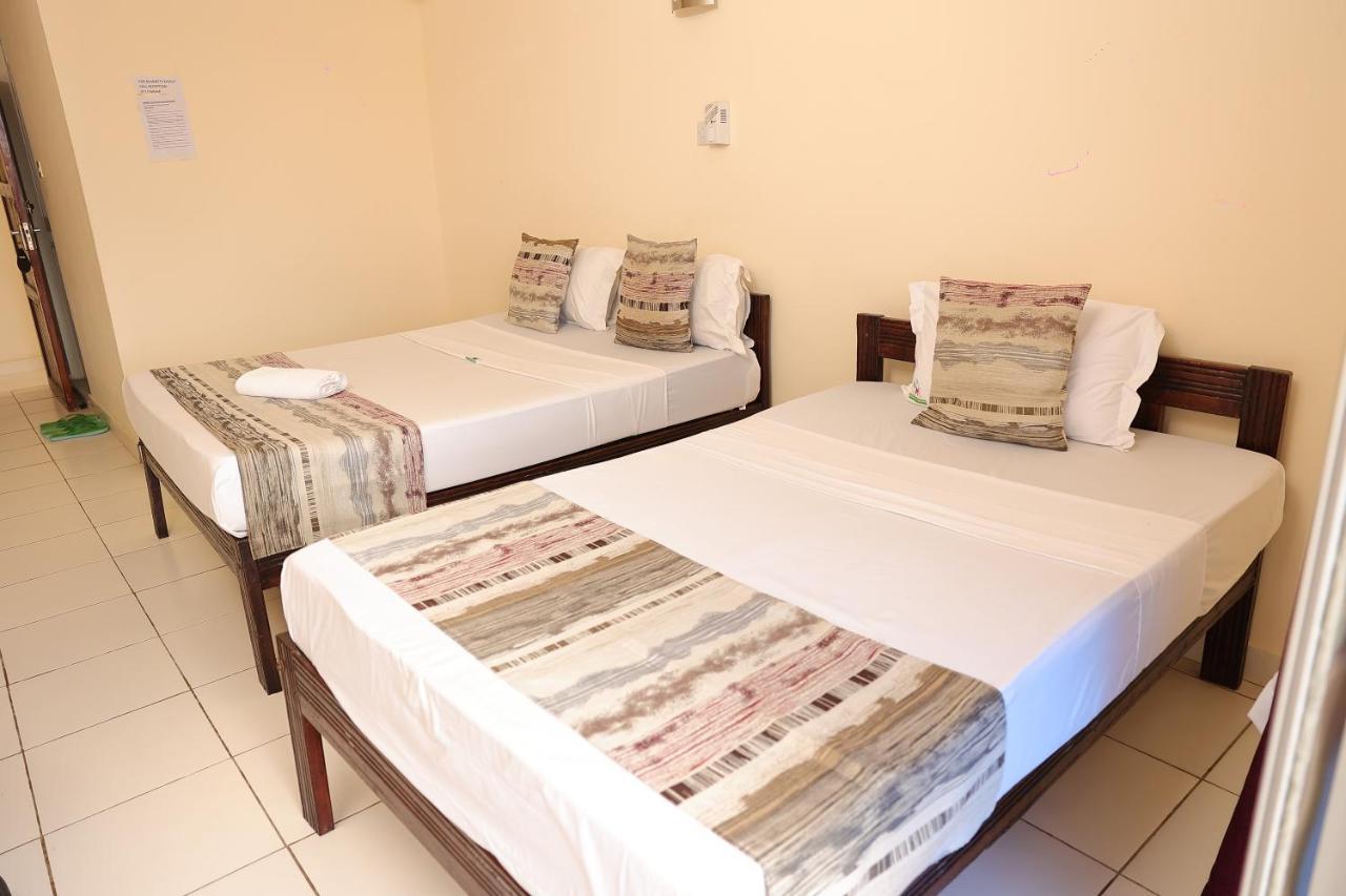 Merry Villa Hotel & Apartments Момбаса Екстериор снимка